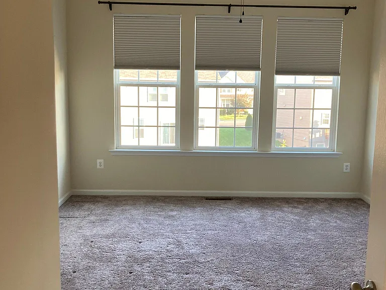 Bright and spacious master bedroom suite.