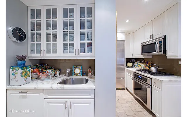 Sold by Douglas Elliman | media 13