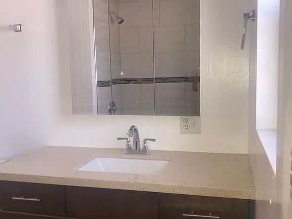 New bathroom cabinets, tile and tub