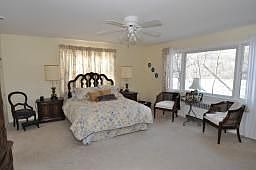 Master Bedroom - Located on first floor,overlooks lake, huge walk-in closet 