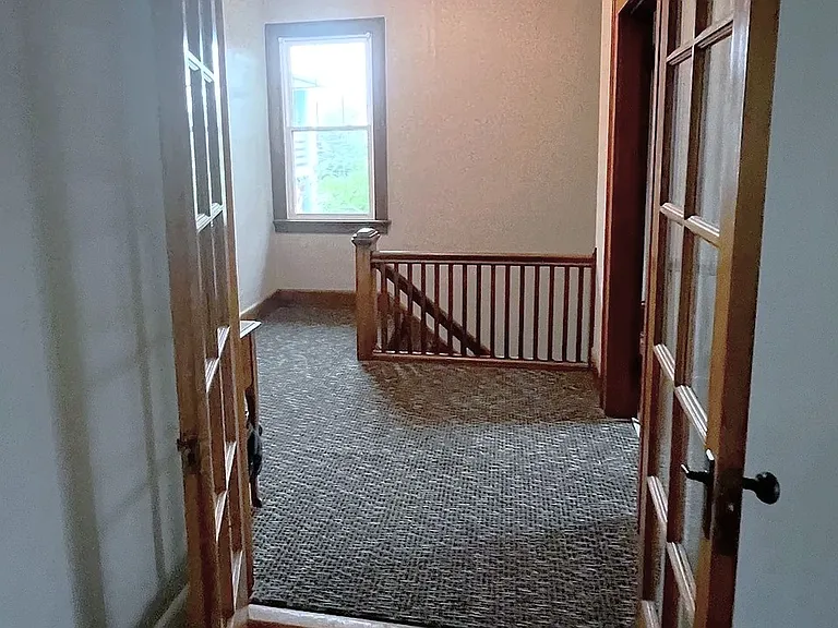 spacious landing at top of stairs