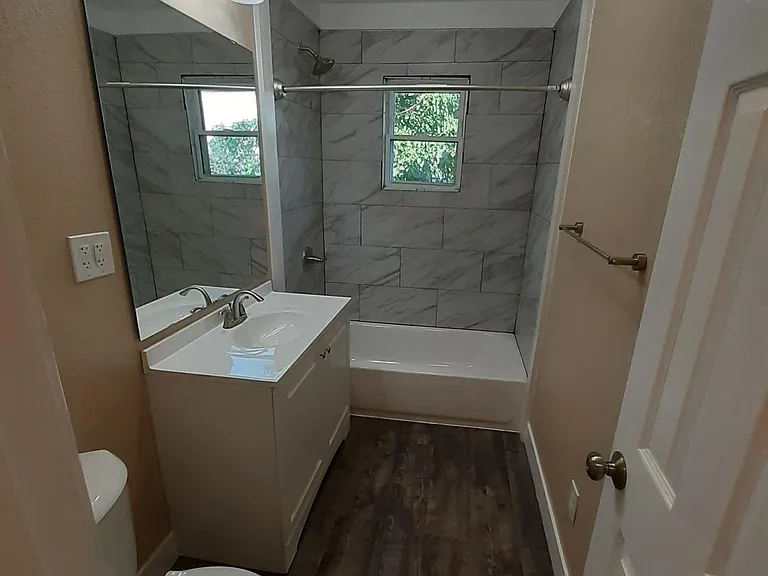 Bathroom with Porcelain tile shower.