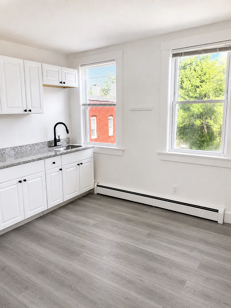 Updated 3-Bedroom Apartment For Rent — Photo 3