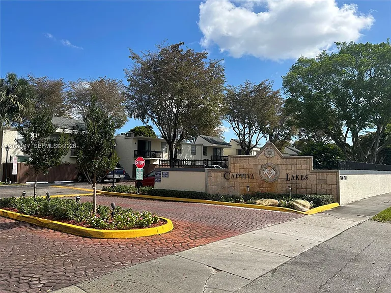 8311 SW 142nd Ave #J202 — Photo 1