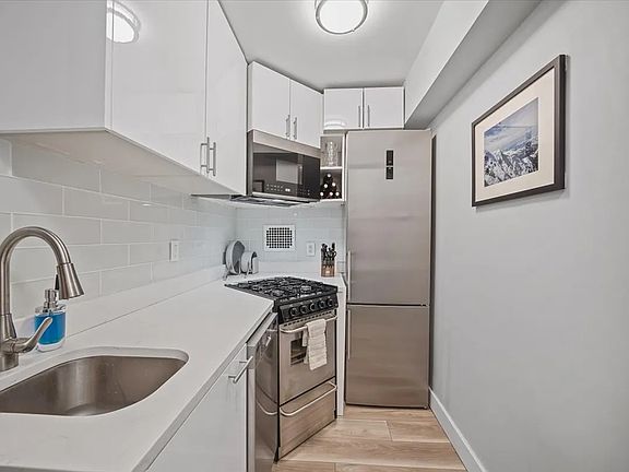 5th image of 220 E 67th St APT 7F