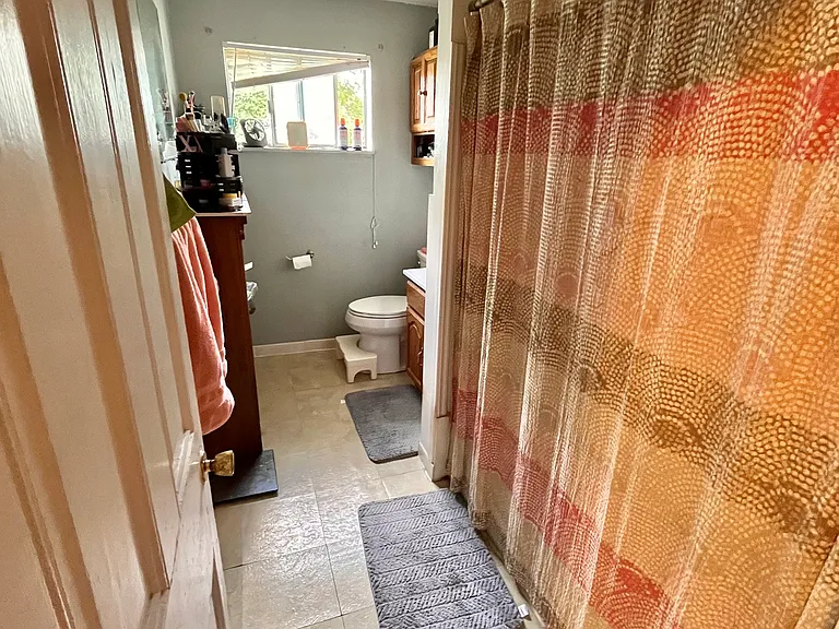 Bathroom with tub/shower.