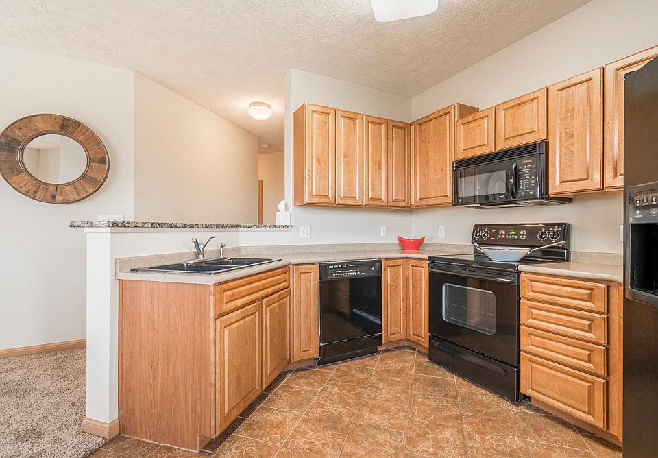 Our villas and duplexes include spacious kitchens with glass-top stoves for easy cleanup.