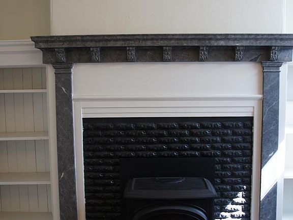 faux marble mantle with frieze work