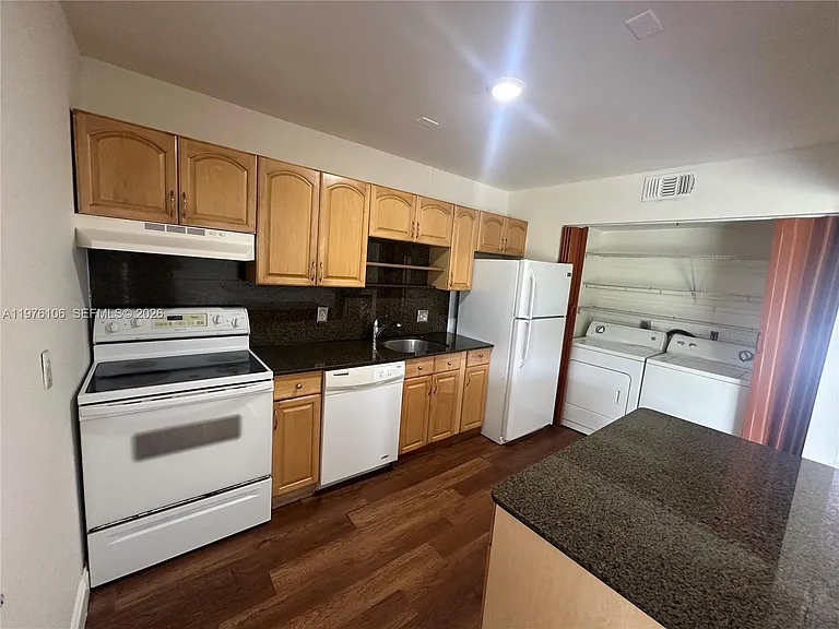 3033 NW 68th St #12E — Photo 7