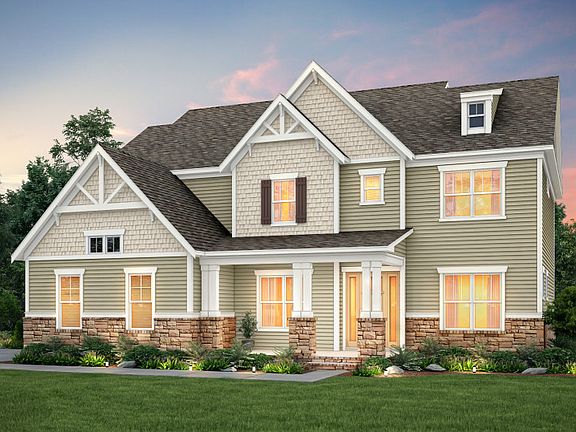 Walden Exterior 1 features Stone, Hardi Board Siding, Shakes and Covered Front Porch