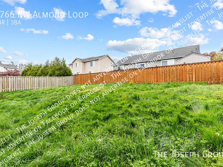 1766 NW Almond Loop — Photo 35