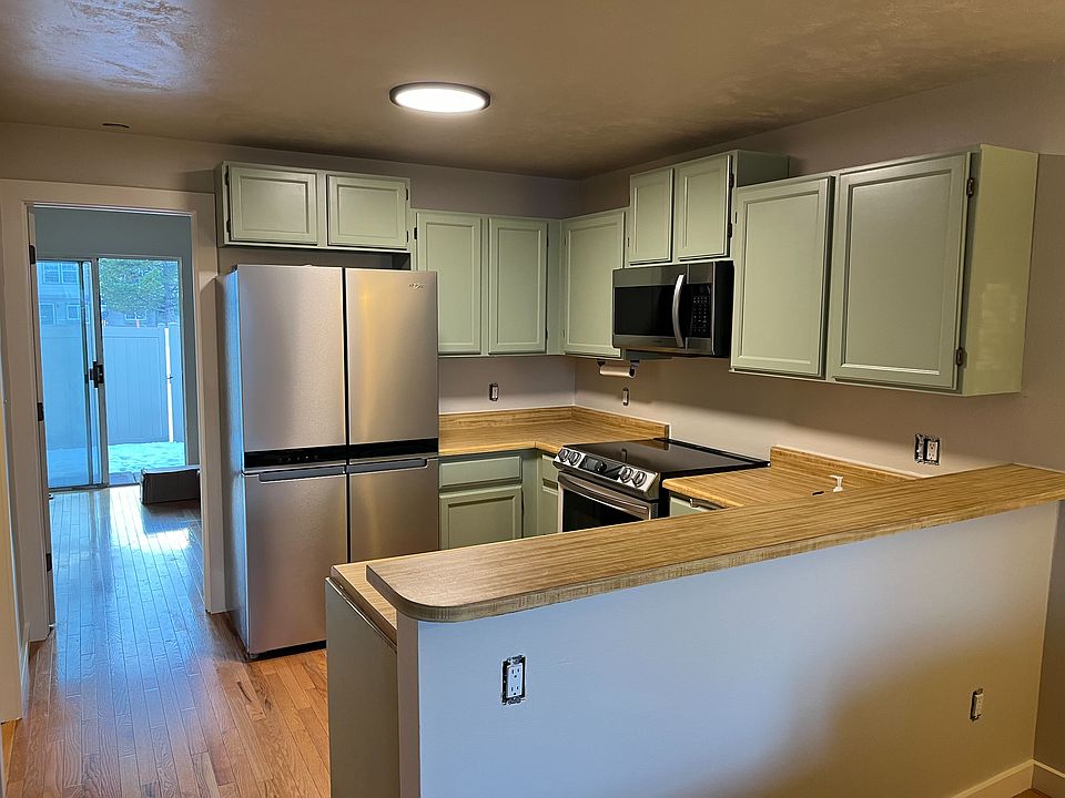 Looking into kitchen and bedroom/backyard.