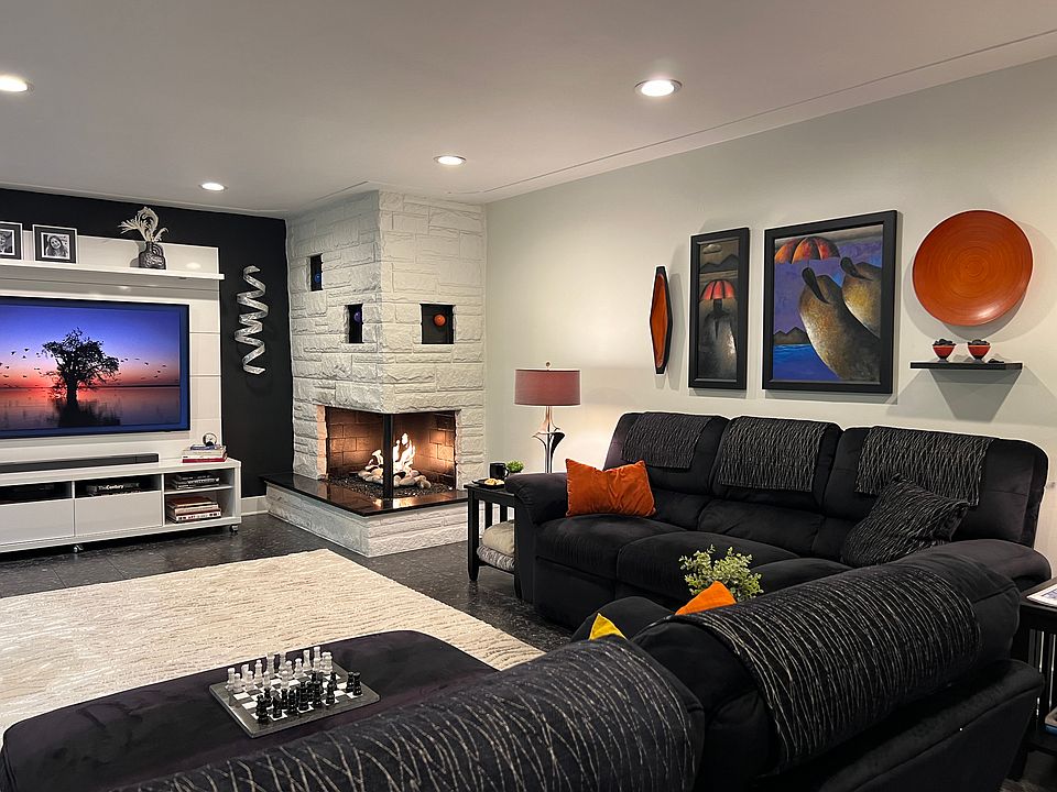 living room with smart tv and gas fireplace
