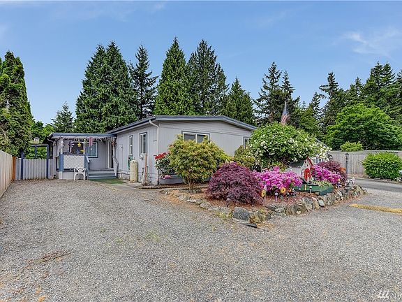 Beautiful landscaping and RV parking.
