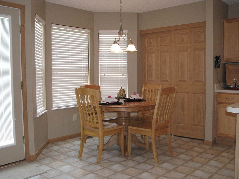 A view looking onto the eating space kitchen with full pantry