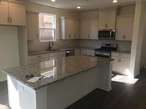 Kitchen at closing, before fridge and lights installed.