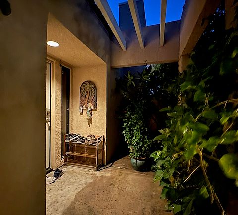 Front Door w tiny Fountain early evening