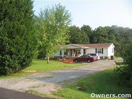 Corner lot, with privacy screen and woods