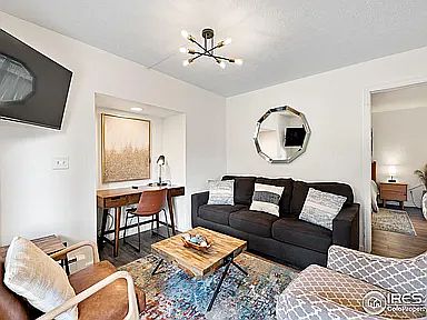 Living room with view of desk