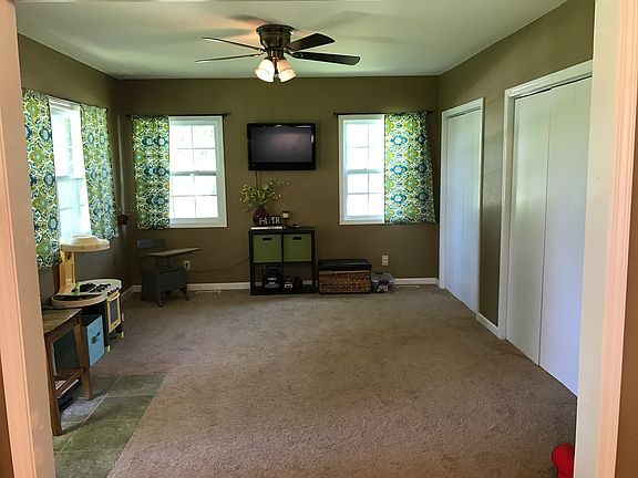 Playroom/Office with closets