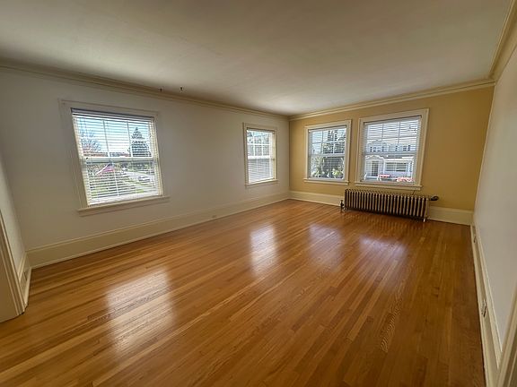 Beautiful large livingroom with original hardwoods