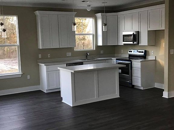 House has stainless steel fridge now.