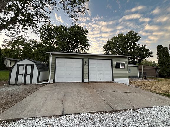 2 car garage and shed with back access road