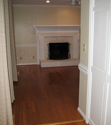 Living Rm w/ wood-burning fireplace