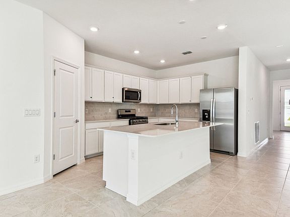 White Kitchen with Quartz Countertops