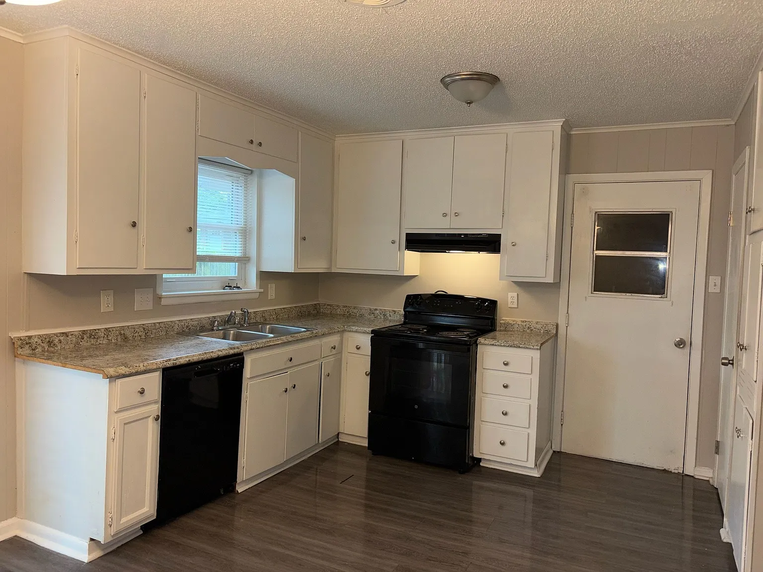 Cozy Single-Story Home with Attached Garage & Fenced Backyard — Photo 4