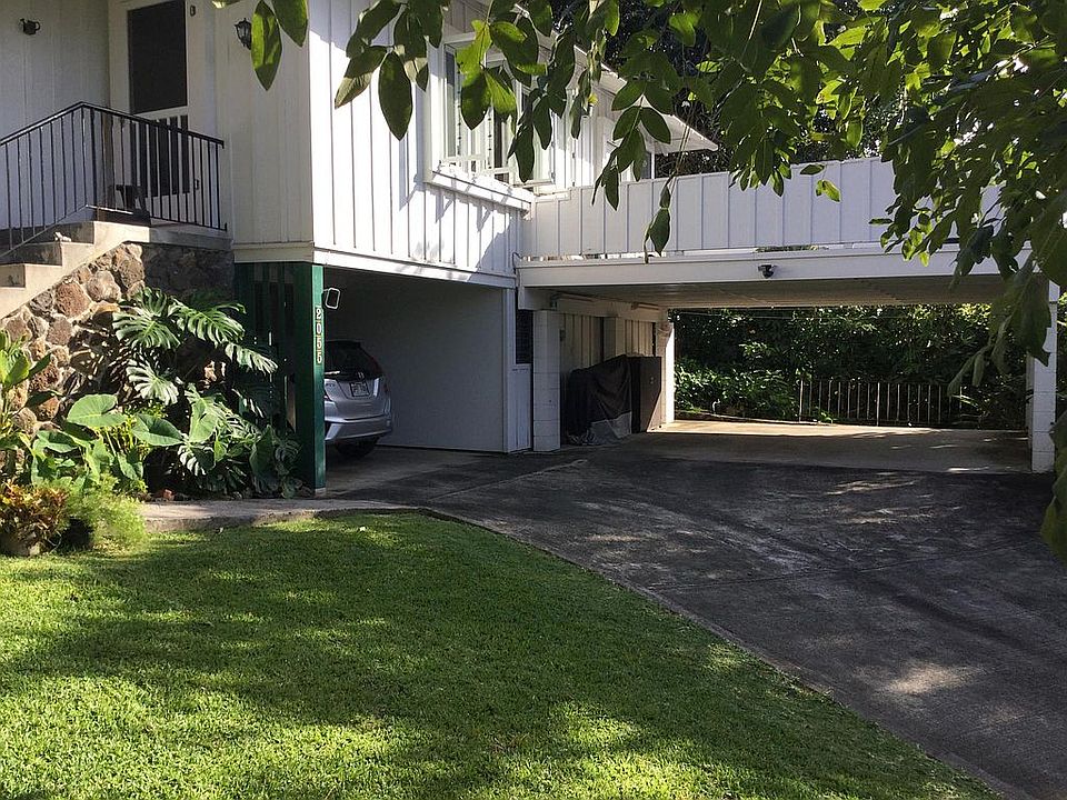Studio is to the left of the carport, under the main house. The main door to the studio is inside the garage. There is covered parking for the tenant in the left side of the carport.