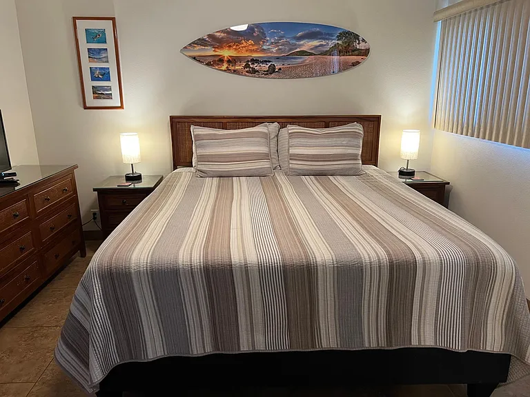 Master bedroom with king size bed.