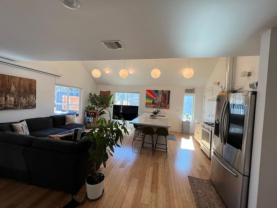 Living Room and Kitchen with Vaulted Ceiling