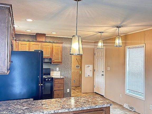 Livingroom view into kitchen