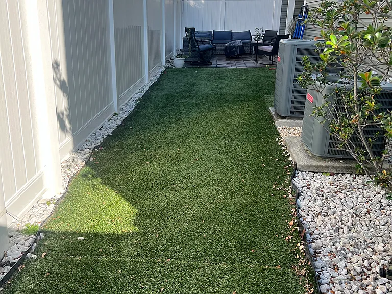 K9 TURF NEWLY INSTALLED IN BACK YARD