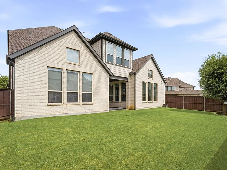 Expansive Fenced Back Yard.