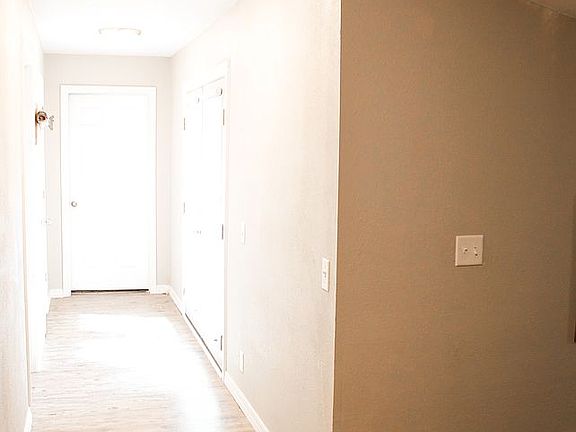Hallway with doors to deck