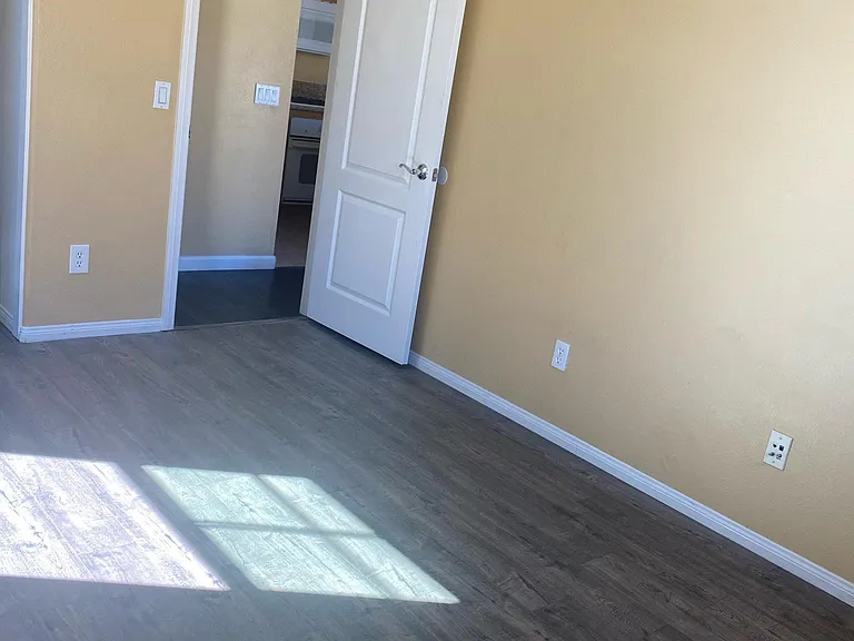 Secondary bedroom with new floors