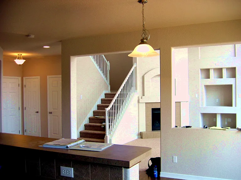 View from kitchen of stairs.
