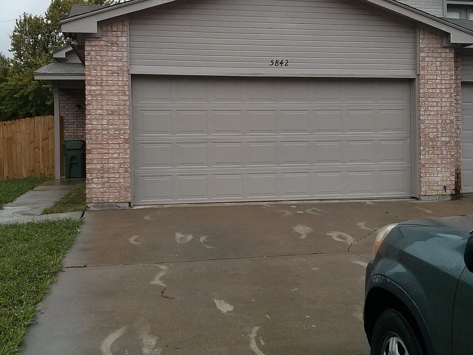 Front with 2 car garage