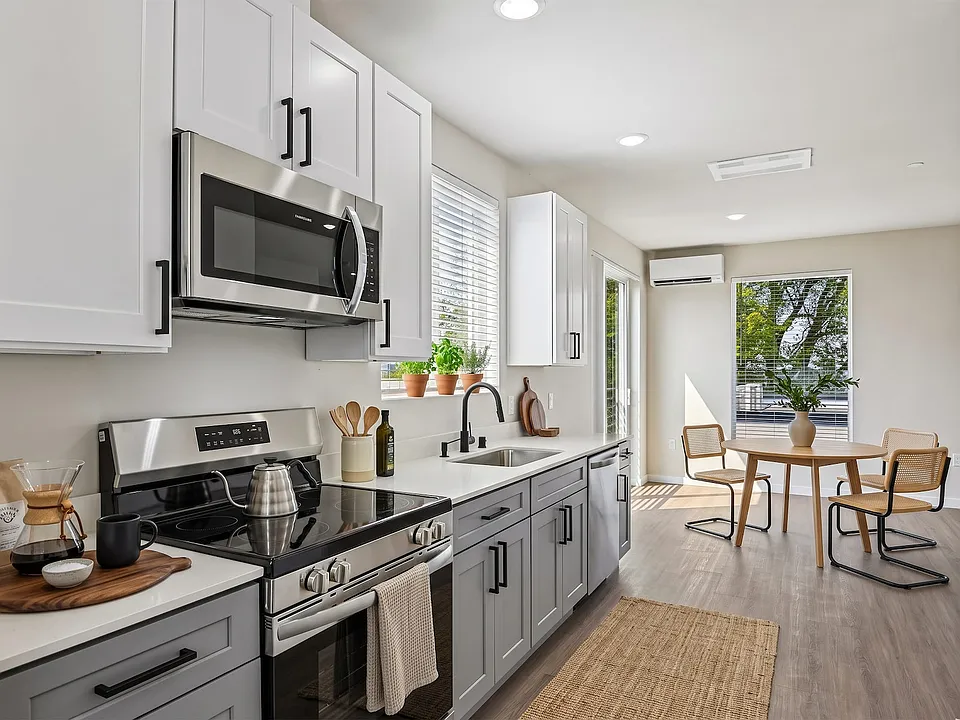 There is room for a real dining table just off the kitchen, not just a counter to eat at.