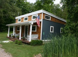 11204 SW Torch Lake Dr, Rapid City, MI 49676