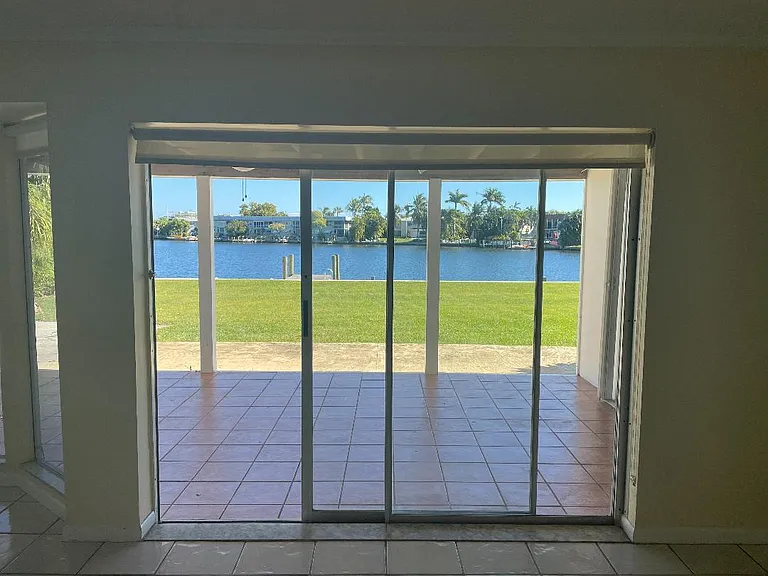 Pocket Sliding Doors in Living Room Overlooking Lake