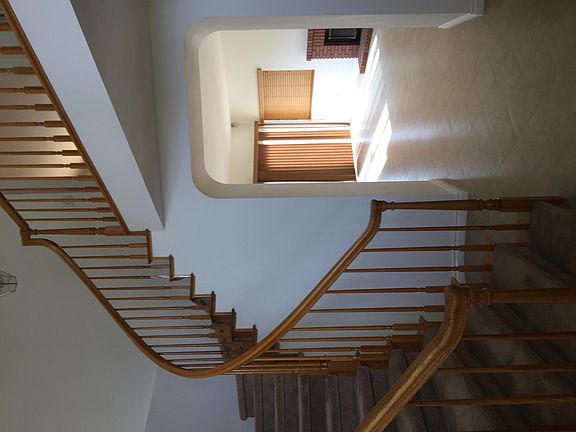 Downstairs hallway leads to family room