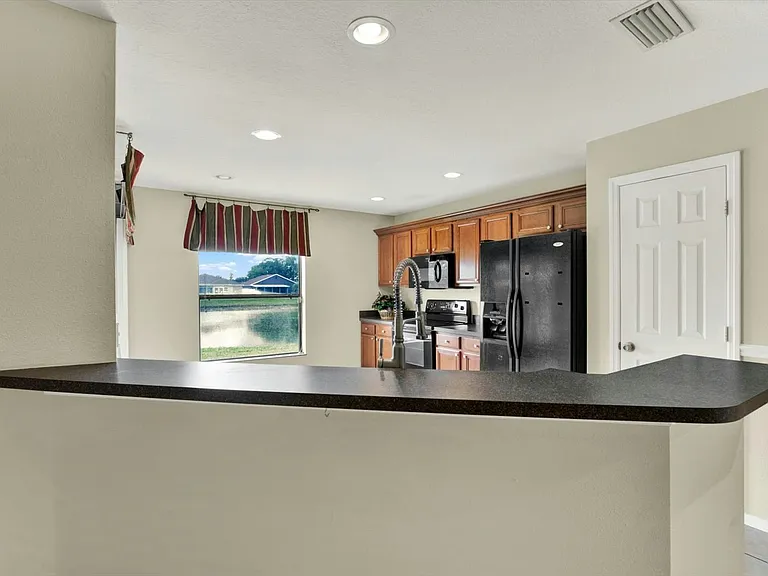 2630 Edgewater Falls Dr — Photo 4