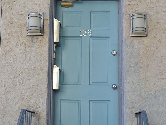 Keyed-access entrance to 2nd floor apartment and 3rd floor apartment is well-lighted automatically by light-sensor.