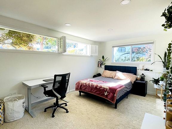 Bedroom 1 with Ikea closet and large windows