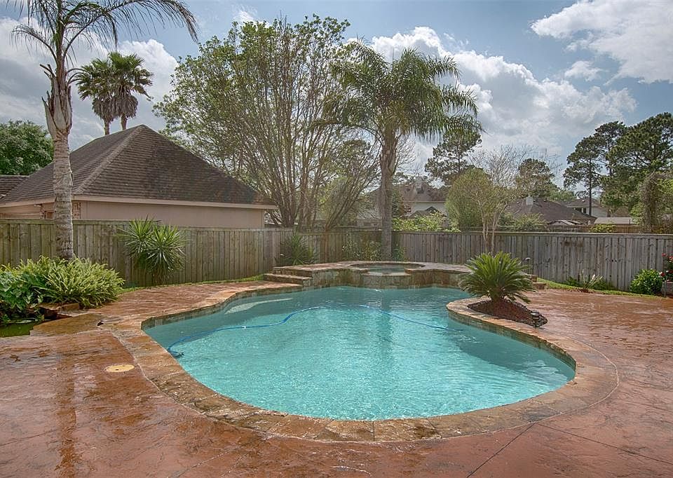A FABULOUS BACKYARD OASIS is only one of the many features you'll enjoy in this lovingly cared for home!