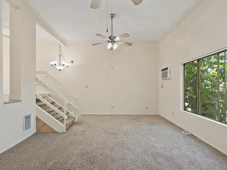 Living Room with High Ceilings on Level 3