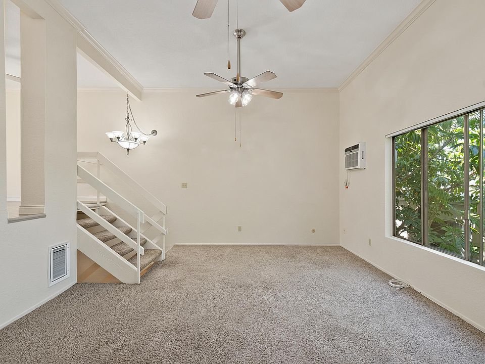 Living Room with High Ceilings on Level 3